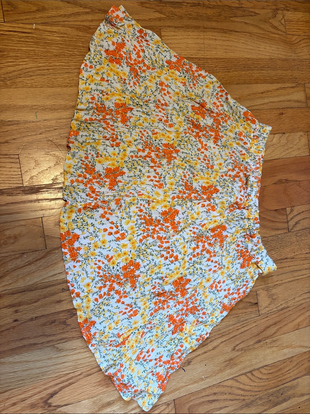 Onyx Floral Smocked mini skirt in Orange and Yellow